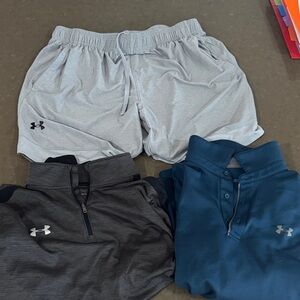 Under Armour men’s lot. Gray shorts (XL), blue polo (XL) & gray pullover (L).